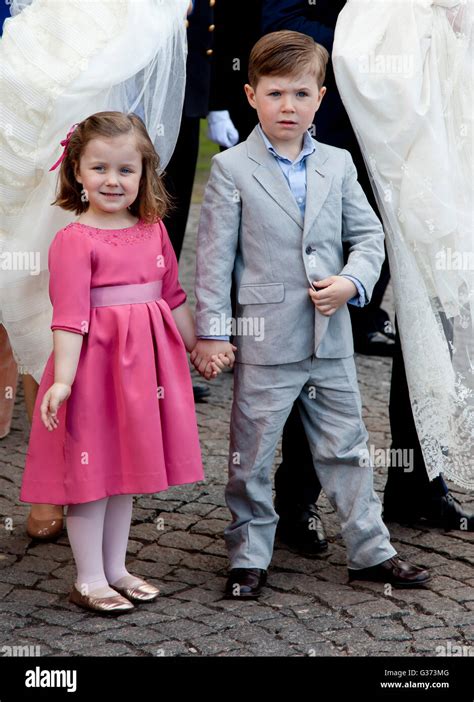 Prince Christian, And Princess Isabella of Denmark attend The Christening of their new brother ...