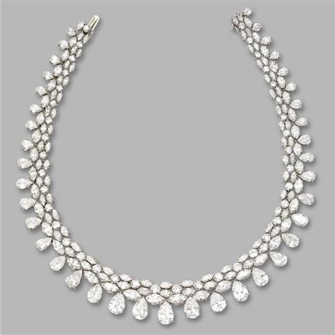 DIAMOND NECKLACE. Pear-shaped, round and marquise-shaped diamonds ...