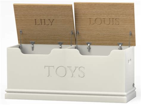 two white toy storage bins with wooden signs on them that say lily, louis and toys