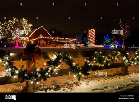 Historic farm decorated with Christmas lights Stock Photo - Alamy