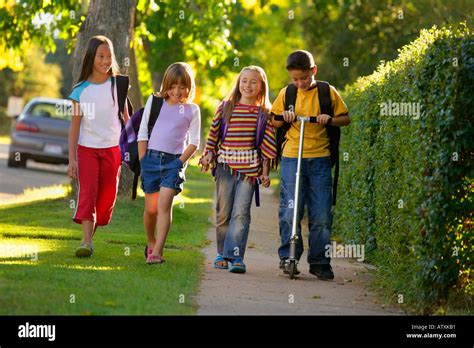 Children walking home from school Stock Photo - Alamy