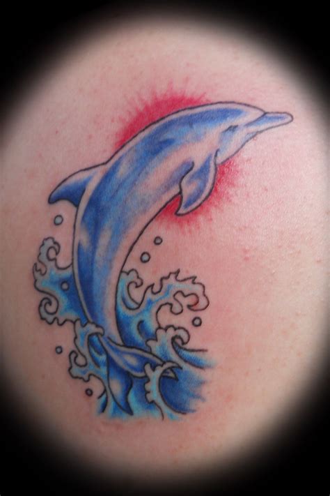 30 Cool Dolphin Tattoos Ideas for Men and Women - MagMent | Dolphins ...