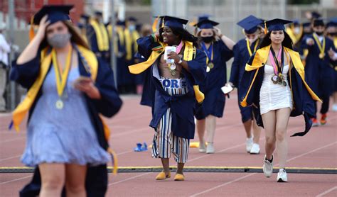 IN PICTURES: After difficult year, 847 students graduate from Millikan ...