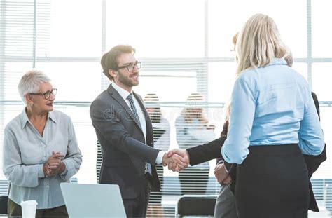 Business People Shaking Hands at an Office Meeting Stock Image - Image ...