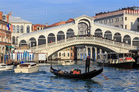 Gondola on Grand Canal and Rialto Bridge in winter, Venice, UNESCO ...