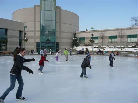 Skating to holiday music at Circle in the Square, City Hall, downtown ...