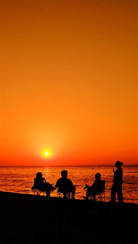 Silhouette of People at the Beach · Free Stock Photo