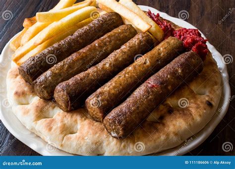 Balkan Cevapcici Kofta or Kofte Kebab with Pide or Pita Bread Stock ...