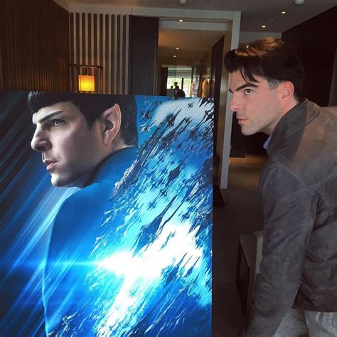 Zachary Quinto posing next to a poster of Spock - Zachary Quinto's Spock Photo (39750306) - Fanpop