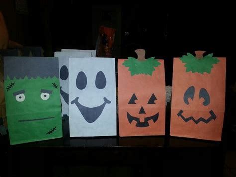 DIY Halloween goody bags. Used Brown paper bags | Halloween paper bags, Paper bag crafts ...