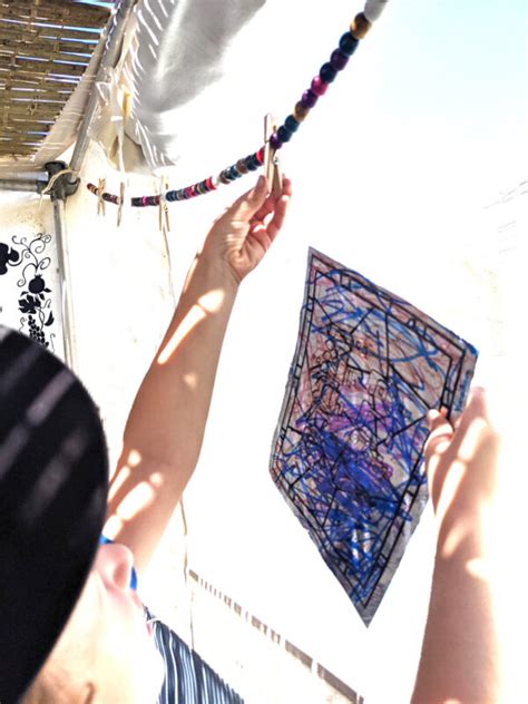 Hanging Kids Sukkah Decorations on a DIY Chain