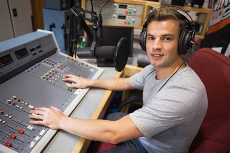 Handsome Smiling Radio Host Moderating Stock Photo - Image of caucasian, mixer: 35783100