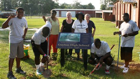 Flowers planted at Guyton High School marker