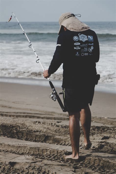 Free Images : fishing rod, shore, natural environment, surf fishing ...