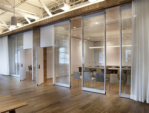 ACOUSTI-CLEAR MOTORIZED GLASS WALLS - Glass Walls and Operable Partitions by ModernfoldStyles