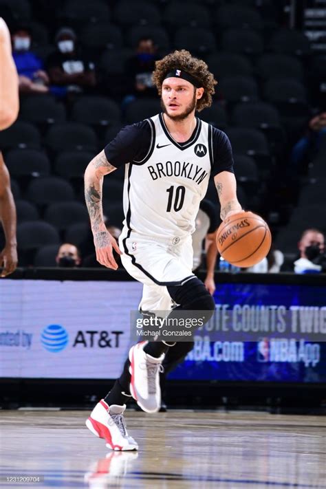 Tyler Johnson of the Brooklyn Nets handles the ball during the game ...