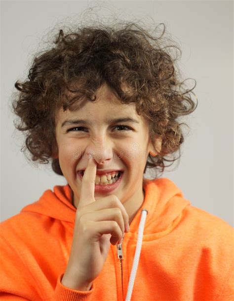 A young boy picks his nose stock image. Image of nostril - 29465973