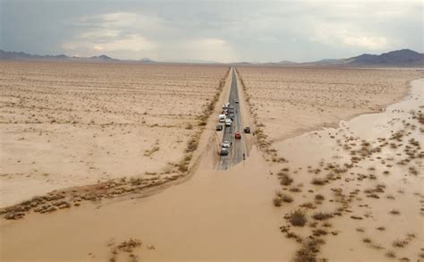 Flash floods close roads into Death Valley National Park while more ...