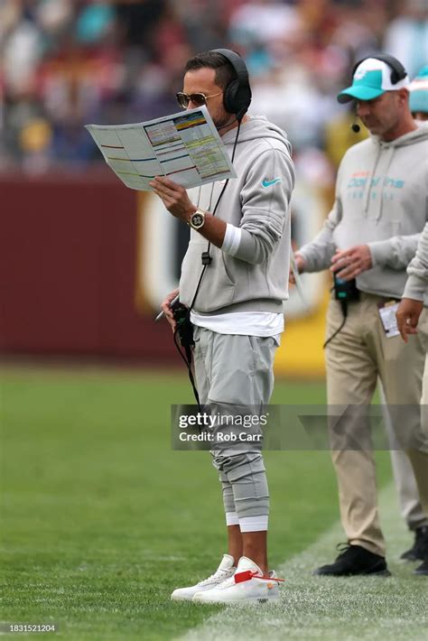 Head coach Mike McDaniel of the Miami Dolphins looks on against the... | Miami dolphins ...