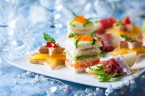 Festive appetizer on the plate Stock Photo by ©sarsmis 88278194