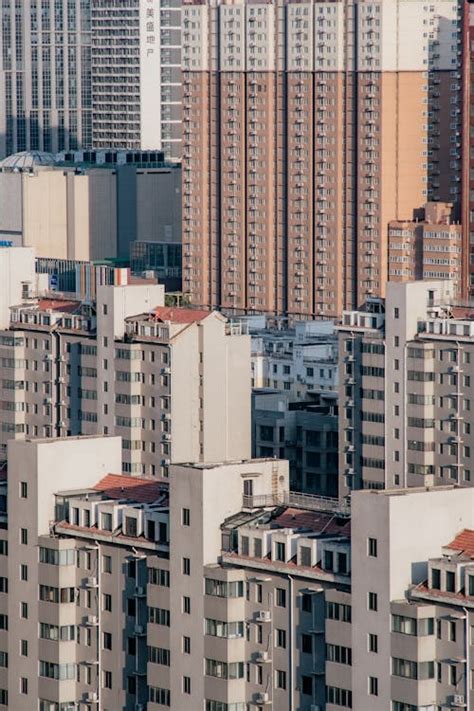 Windows of Apartment Buildings · Free Stock Photo