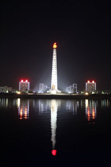 Tower of the Juche Idea at night- Pyongyang North Korea - Photorator