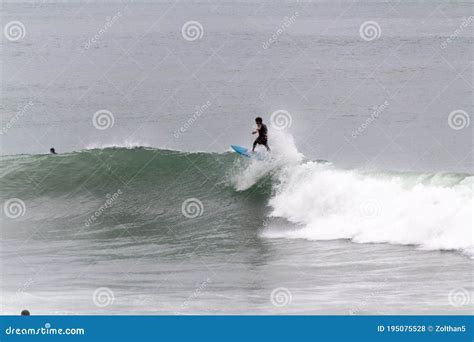 Surfers Taking Waves and Resting in Barceloneta Beach in Barcelona ...