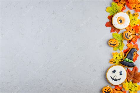 Premium Photo | Halloween background with cookies pumpkin leaf