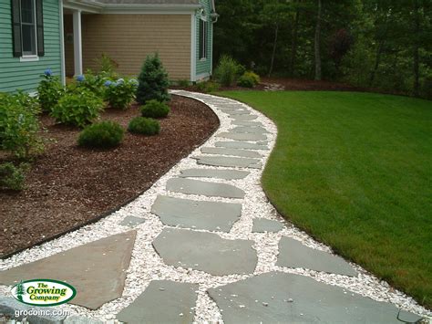 Walkway of flagstone set in seashells. | Flagstone patio, Patio border ...