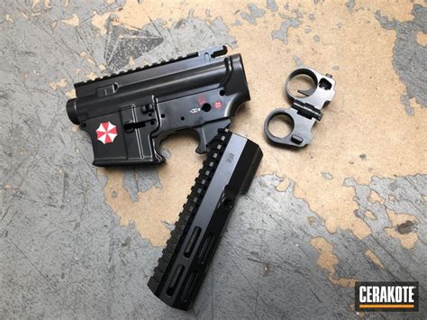 Umbrella Corp Themed Gun Parts by ABELARDO ROMAN | Cerakote