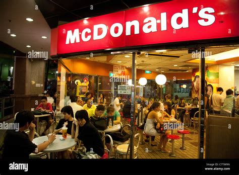 People eating in McDonalds, Singapore Asia Stock Photo - Alamy