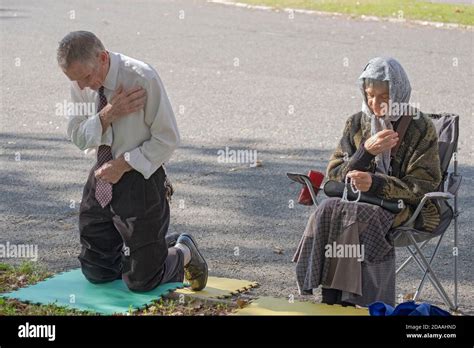 Christian couple praying together hi-res stock photography and images ...