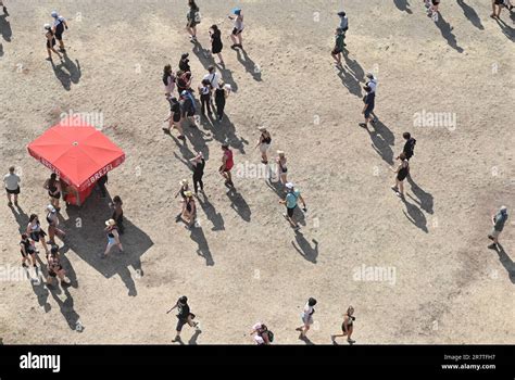 17 June 2023, Lower Saxony, Scheeßel: Festival visitors are on the move at the Hurricane ...