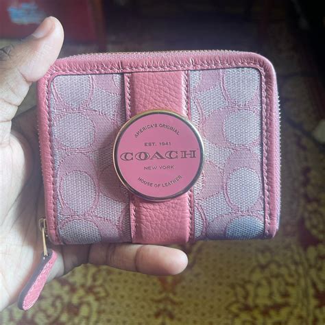 pink coach wallet has blue stains on the bottom but... - Depop