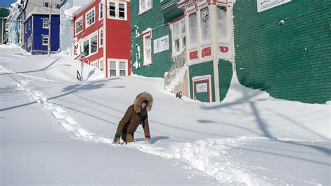 Photos show staggering snow pile-up in Canada after a weekend blizzard | Mashable