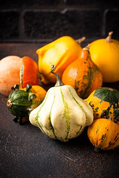 Premium Photo | Assortment of decorative colorful pumpkins