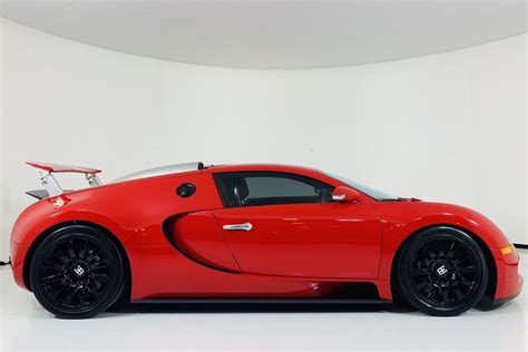 Autotrader Find: Bright Red, High-Mileage Bugatti Veyron - Autotrader