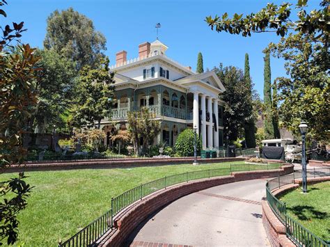 Disneyland Replacing Grass with Artificial Turf on Haunted Mansion Lawn and Mickey Mouse Floral ...