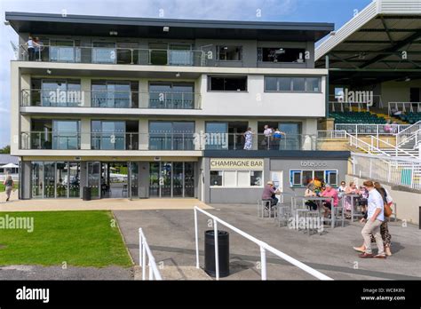 Bath Racecourse, Lansdown, Bath, Somerset, England, UK - view of Kelston Stand and racegoers ...