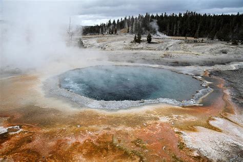 Hot springs and Geysers in Yellowstone Photograph by Pierre Leclerc ...