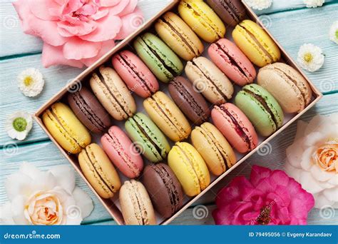 Colorful Macaroons in a Gift Box and Roses Stock Photo - Image of assortment, cookie: 79495056