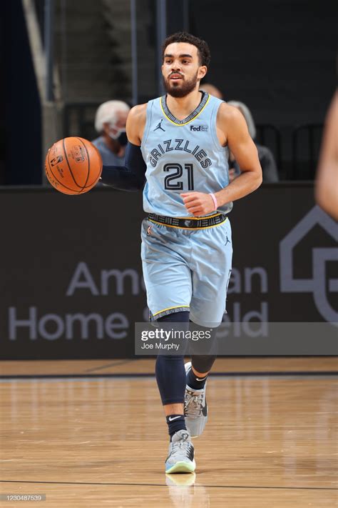 Tyus Jones of the Memphis Grizzlies handles the ball during the game ...