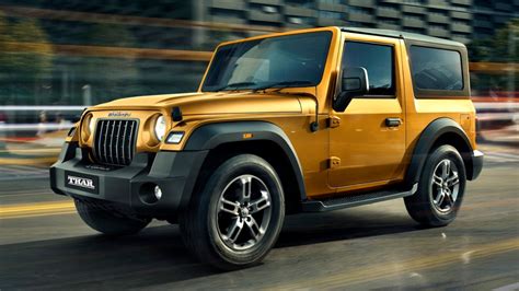 Maruti Suzuki Jimny 5-door vs Mahindra Thar: Price, specs comparison - Car News | The Financial ...