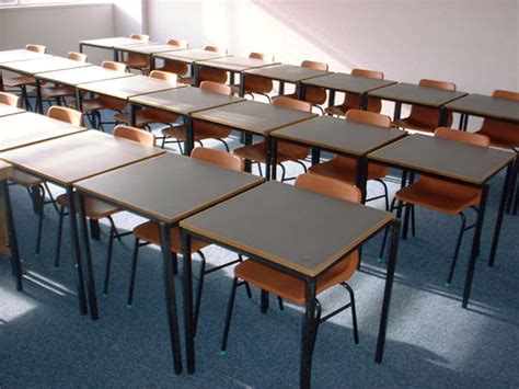 Three Rows of Student Desks and Chairs