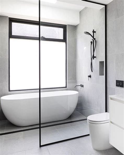 Wetroom shower with freestanding tub - Are the tubs tilted for slope?