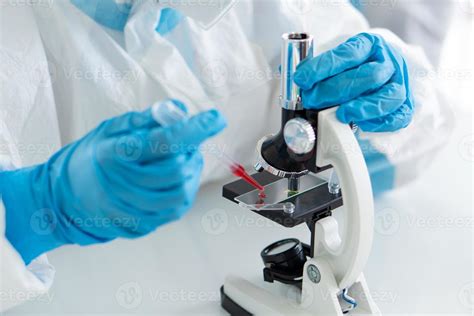 Scientist doing experiment on DNA in lab 3314332 Stock Photo at Vecteezy