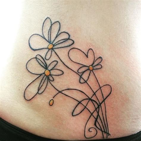 Lower Back Daisy Tattoos