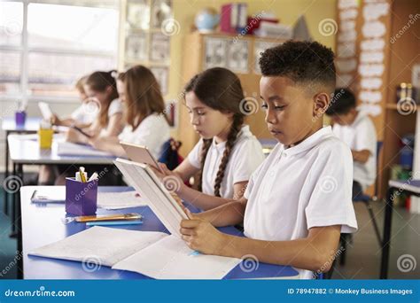 Kids Use Tablet Computers in Primary School Class, Close Up Stock Photo ...