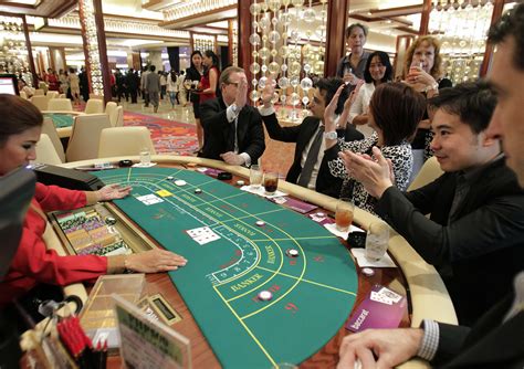 Bettors try their luck at the baccarat table in new PHL casino | Photos ...