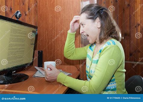 Angry Mature Woman at Computer Stock Image - Image of person, sitting: 51770605